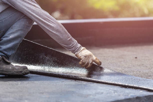 Professional Exterior Waterproofing technician working in Evart, MI